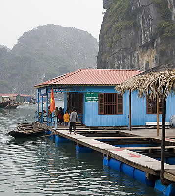 Red Dragon Junk, Halong Bay, Vietnam - plastic barrel floaters Red Dragon Junk, Halong Bay, Vietnam - plastic barrel floaters