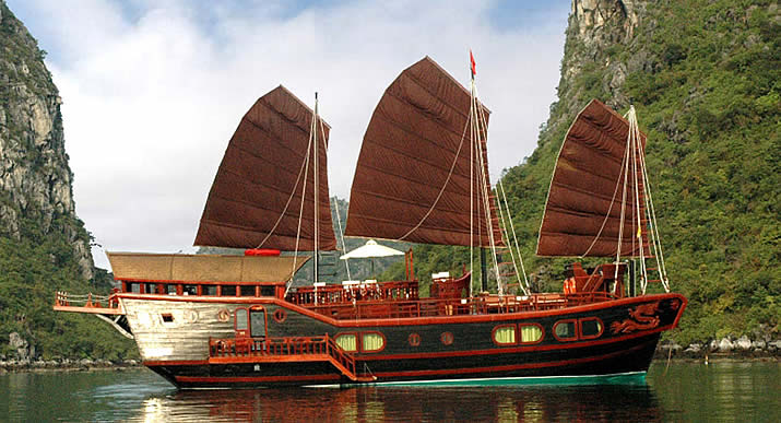 Red Dragon Junk, Halong Bay, Vietnam - side view Red Dragon Junk, Halong Bay, Vietnam - side view