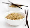 Chopsticks and bowl of rice